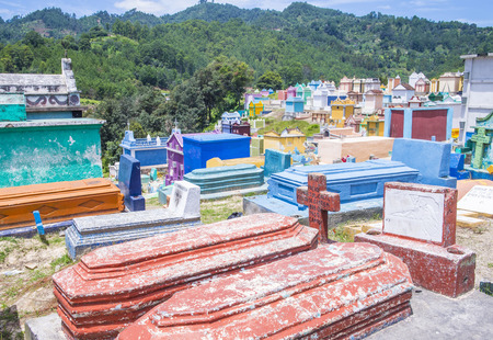 CHICHICASTENANGO , GUATEMALA - JULY 26 : Colorful Cemetery in Chichicastenango on July 26 2015. in Guatemala family members paint the tombstone as a way of honoring the deadのeditorial素材
