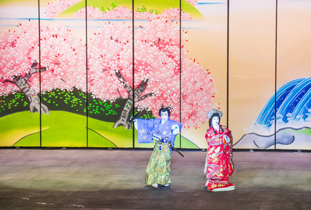 LAS VEGAS - AUG 16 : Traditional Japanese Kabuki performance in front of the Bellagio hotel and casino fountains on August 16 2015. Kabuki is a classical Japanese dance-dramaのeditorial素材