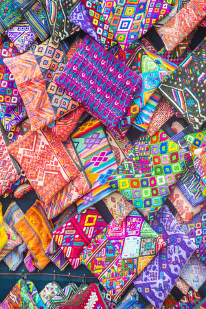 CHICHICASTENANGO , GUATEMALA - JULY 26 : Mayan textile designs in the Chichicastenango Market on July 26 2015. This native market is the most colorful in Central Americaのeditorial素材
