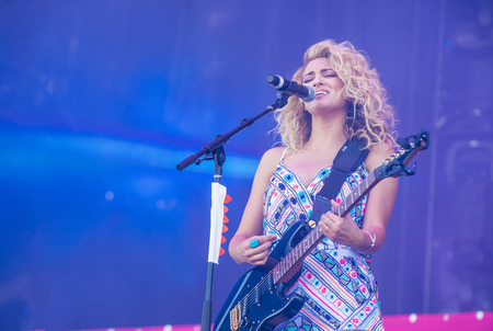 LAS VEGAS - SEP 19 : Singer Tori Kelly performs onstage at the 2015 iHeartRadio Music Festival at the Las Vegas Village on September 19, 2015 in Las Vegas, Nevada.のeditorial素材
