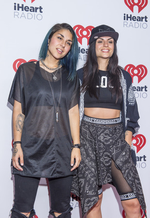 LAS VEGAS - SEP 18 : DJs/sisters Yasmine Yousaf (R) and Jahan Yousaf of Krewella attends the 2015 iHeartRadio Music Festival at the MGM Grand Garden Arena on September 18, 2015 in Las Vegas.のeditorial素材