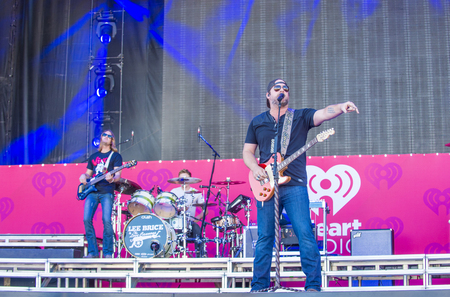 LAS VEGAS - SEP 19 : Singer/songwriter Lee Brice performs onstage at the 2015 iHeartRadio Music Festival at the Las Vegas Village on September 19, 2015 in Las Vegas, Nevada.のeditorial素材