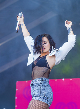 LAS VEGAS - SEP 19 : Recording artist Demi Lovato performs onstage at the 2015 iHeartRadio Music Festival at the Las Vegas Village on September 19, 2015 in Las Vegas, Nevada.のeditorial素材