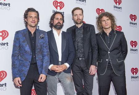 LAS VEGAS - SEP 18 : (L-R) Brandon Flowers, Ronnie Vannucci, Jr., Mark Stoermer and Dave Keuning of The Killers attends the 2015 iHeartRadio Music Festival on September 18, 2015 in Las Vegas.のeditorial素材