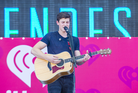 LAS VEGAS - SEP 19 : Singer Shawn Mendes performs onstage at the 2015 iHeartRadio Music Festival at the Las Vegas Village on September 19, 2015 in Las Vegas, Nevada.のeditorial素材