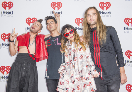 LAS VEGAS - SEP 19 : Musicians (L-R) Cole Whittle, Joe Jonas, JinJoo Lee and Jack Lawless of DNC attends the 2015 iHeartRadio Music Festival on September 19, 2015 in Las Vegas, Nevada.のeditorial素材