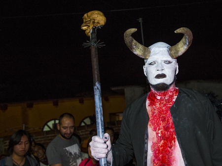 OAXACA , MEXICO  - NOV 02 : Unknown participant on a carnival of the Day of the Dead in Oaxaca,...