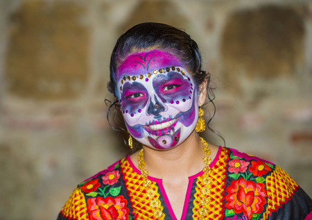 OAXACA , MEXICO  - NOV 02 : Unknown participant on a carnival of the Day of the Dead in Oaxaca,...
