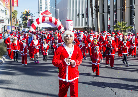 LAS VEGAS - DEC 05 : An Unidentified participants at the Las Vegas Great Santa Run on December 05 2015 in Las Vegas Nevada. It is the largest gatherings of Santa runners in the world.のeditorial素材