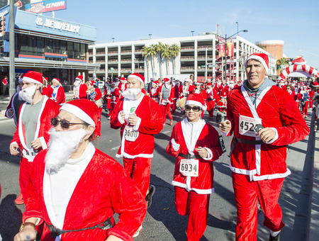 LAS VEGAS - DEC 05 : An Unidentified participants at the Las Vegas Great Santa Run on December 05 2015 in Las Vegas Nevada. It is the largest gatherings of Santa runners in the world.のeditorial素材