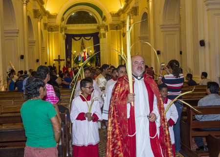 GRANADA , NICARAGUA - MARCH 20 : Unidentified Nicaraguan take part in the Palm sunday procession in...
