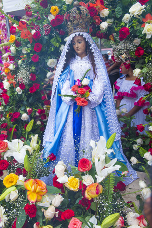 PANCHIMALCO , EL SALVADOR - MAY 08 : Altar with a statue of Virgin Mary at the procession of the Flower & Palm Festival in Panchimalco, El Salvador on May 08 2016のeditorial素材