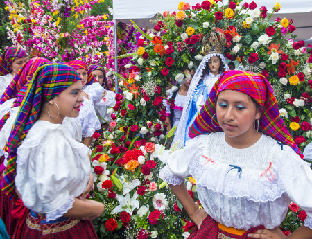 PANCHIMALCO , EL SALVADOR - MAY 08 : Salvadorian women participate in the procession of the Flower & Palm Festival in Panchimalco, El Salvador on May 08 2016のeditorial素材