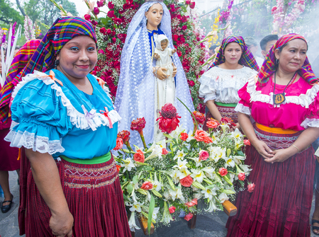 PANCHIMALCO , EL SALVADOR - MAY 08 : Salvadorian women participate in the procession of the Flower & Palm Festival in Panchimalco, El Salvador on May 08 2016のeditorial素材