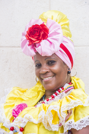 HAVANA, CUBA - JULY 18 : Cuban women with traditional clothing in old Havana street on July 18 2016. The historic center of Havana is UNESCO World Heritage Site since 1982.のeditorial素材