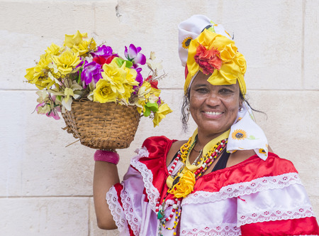 HAVANA, CUBA - JULY 18 : Cuban women with traditional clothing in old Havana street on July 18 2016. The historic center of Havana is UNESCO World Heritage Site since 1982.のeditorial素材