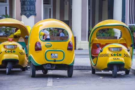 HAVANA, CUBA - JULY 18 : A Cocotaxis in old Havana street on July 18 2016. Cocotaxi is an auto rickshaw type taxi vehicle a cheap way to go from one point to the other in Havana.のeditorial素材