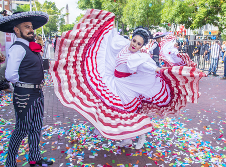 GUADALAJARA , MEXICO - AUG 28 : Participants in a parde during the 23rd International Mariachi &...