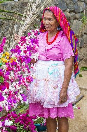 Panchimalco El Salvador May 08 A Salvadoran Woman Decorates Palm Fronds With Flowers During The Flower Palm Festival In Panchimalco El Salvador On May 08 16 Royalty Free Images Photos And Pictures