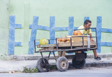 HAVANA, CUBA - JULY 18 : A Cuban fruits seller in old Havana street on July 18 2016. The historic center of Havana is UNESCO World Heritage Site since 1982.のeditorial素材