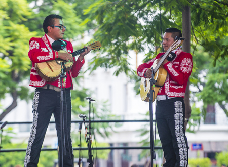 GUADALAJARA , MEXICO - AUG 28 : Mariachis perform on stage at the 23rd International Mariachi & Charros festival in Guadalajara Mexico on August 28 , 2016.のeditorial素材