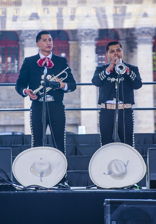 GUADALAJARA , MEXICO - AUG 28 : Mariachis perform on stage at the 23rd International Mariachi & Charros festival in Guadalajara Mexico on August 28 , 2016.のeditorial素材