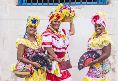 HAVANA, CUBA - JULY 18 : Cuban women with traditional clothing in old Havana street on July 18 2016. The historic center of Havana is UNESCO World Heritage Site since 1982.のeditorial素材