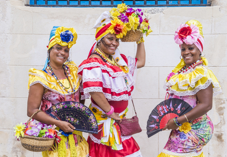 HAVANA, CUBA - JULY 18 : Cuban women with traditional clothing in old Havana street on July 18 2016. The historic center of Havana is UNESCO World Heritage Site since 1982.のeditorial素材