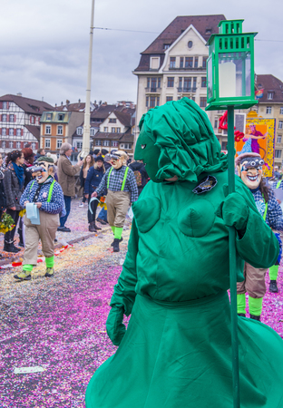 BINCHE , BELGIUM - FEB 26 : Participants in the Binche Carnival in Binche, Belgium on February 26 2017. The Binche carnival is included in a list of intangible heritageのeditorial素材