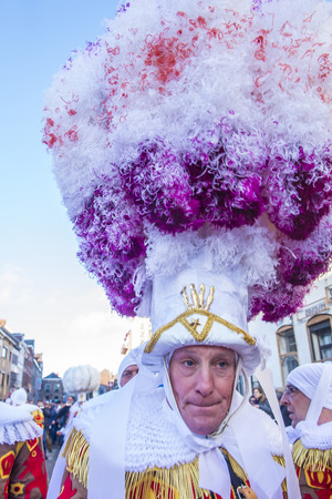 BINCHE , BELGIUM - FEB 26 : Participants in the Binche Carnival in Binche, Belgium on February 26 2017. The Binche carnival is included in a list of intangible heritageのeditorial素材
