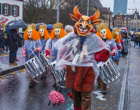 BASEL , SWITZERLAND - MARCH 08 : Participants in the Basel Carnival in Basel , Switzerland on March 08 2017. The Basel carnival has been listed as one of the top local festivities in Europeのeditorial素材