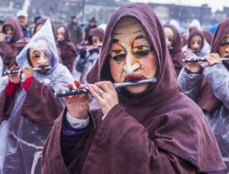 BASEL , SWITZERLAND - MARCH 08 : Participants in the Basel Carnival in Basel , Switzerland on March 08 2017. The Basel carnival has been listed as one of the top local festivities in Europeのeditorial素材