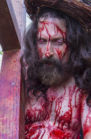 JERUSALEM - APRIL 14 : Christian pilgrim re-enact the crucifixtion of Jesus along the Via Dolorosa in Jerusalem during Good friday on April 14 2017のeditorial素材