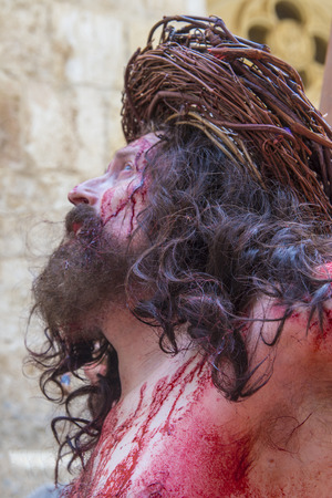JERUSALEM - APRIL 14 : Christian pilgrim re-enact the crucifixtion of Jesus along the Via Dolorosa in Jerusalem during Good friday on April 14 2017のeditorial素材