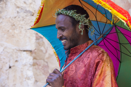 JERUSALEM - APRIL 15 : Ethiopian Orthodox worshiper waiting for the Holy fire ceremony to begin at the Ethiopian section of the Holy Sepulcher in Jerusalm Israel on April 15 2017のeditorial素材