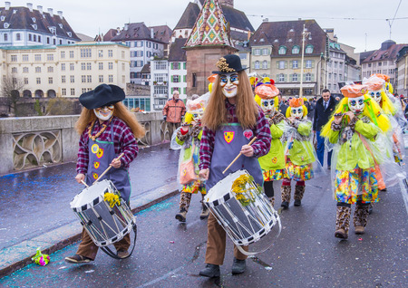BASEL , SWITZERLAND - MARCH 08 : Participants in the Basel Carnival in Basel , Switzerland on March...