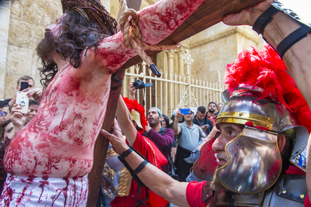 JERUSALEM - APRIL 14 : Christian pilgrims re-enact the crucifixtion of Jesus along the Via Dolorosa in Jerusalem during Good friday on April 14 2017のeditorial素材