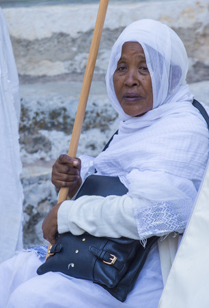 JERUSALEM - APRIL 15 : Ethiopian Orthodox worshiper waiting for the Holy fire ceremony to begin at the Ethiopian section of the Holy Sepulcher in Jerusalm Israel on April 15 2017のeditorial素材