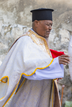 JERUSALEM - APRIL 15 : Ethiopian Orthodox worshiper waiting for the Holy fire ceremony to begin at the Ethiopian section of the Holy Sepulcher in Jerusalm Israel on April 15 2017のeditorial素材