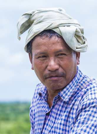 SHAN STATE , MYANMAR - SEP 06: Portrait of a Burmese farmer in Shan state Myanmar on September 06 2017 , agriculture is the main industry in Myanmarのeditorial素材