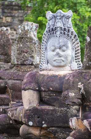 SIEM REAP , CAMBODIA - OCT 15 : Statues at the South Gate of Angkor Thom, Siem Reap Cambodia on October 15 2017 , Angkor Thom was the last and capital city of the Khmer empire.のeditorial素材