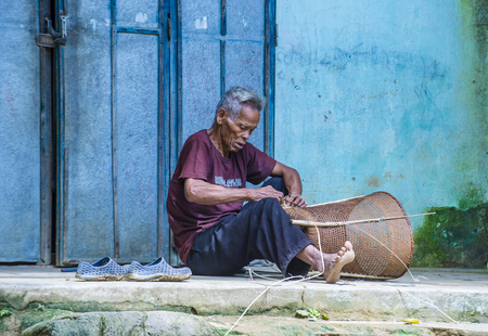 QUANG NAM , VIETNAM - OCT 07 : Portrait of a man from the Cotu Minority in Quang Nam Vietnam  on October 07 2017. The Cotu minority mostly live in central Vietnam and eastern Laosのeditorial素材