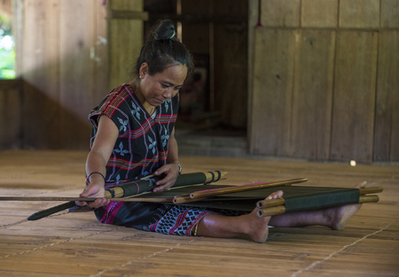 QUANG NAM , VIETNAM - OCT 07 : Portrait of a woman from the Cotu Minority in Quang Nam Vietnam  on October 07 2017. The Cotu minority mostly live in central Vietnam and eastern Laosのeditorial素材