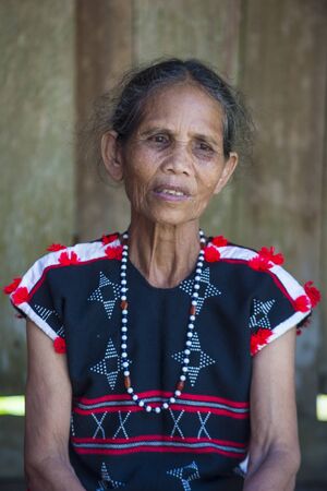 QUANG NAM , VIETNAM - OCT 07 : Portrait of a woman from the Cotu Minority in Quang Nam Vietnam  on October 07 2017. The Cotu minority mostly live in central Vietnam and eastern Laosのeditorial素材
