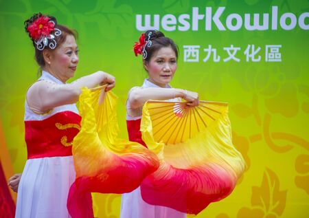 HONG KONG - MARCH 04 : Participants in the 14th Tai Kok Tsui temple fair in Hong Kong on March 04 2018. The temple fair is a Chinese cultural event held annuallyのeditorial素材