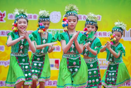 HONG KONG - MARCH 04 : Participants in the 14th Tai Kok Tsui temple fair in Hong Kong on March 04 2018. The temple fair is a Chinese cultural event held annuallyのeditorial素材