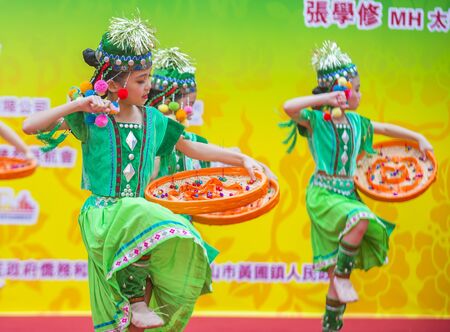HONG KONG - MARCH 04 : Participants in the 14th Tai Kok Tsui temple fair in Hong Kong on March 04 2018. The temple fair is a Chinese cultural event held annuallyのeditorial素材