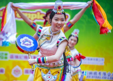 HONG KONG - MARCH 04 : Participants in the 14th Tai Kok Tsui temple fair in Hong Kong on March 04...