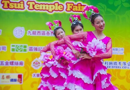 HONG KONG - MARCH 04 : Participants in the 14th Tai Kok Tsui temple fair in Hong Kong on March 04 2018. The temple fair is a Chinese cultural event held annuallyのeditorial素材