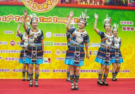 HONG KONG - MARCH 04 : Participants in the 14th Tai Kok Tsui temple fair in Hong Kong on March 04 2018. The temple fair is a Chinese cultural event held annuallyのeditorial素材